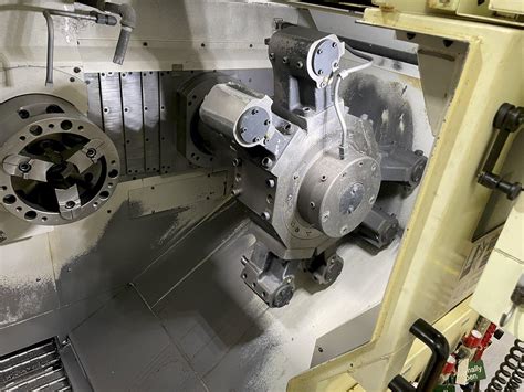 torno cnc muratec|muratec twin spindle turning machine.